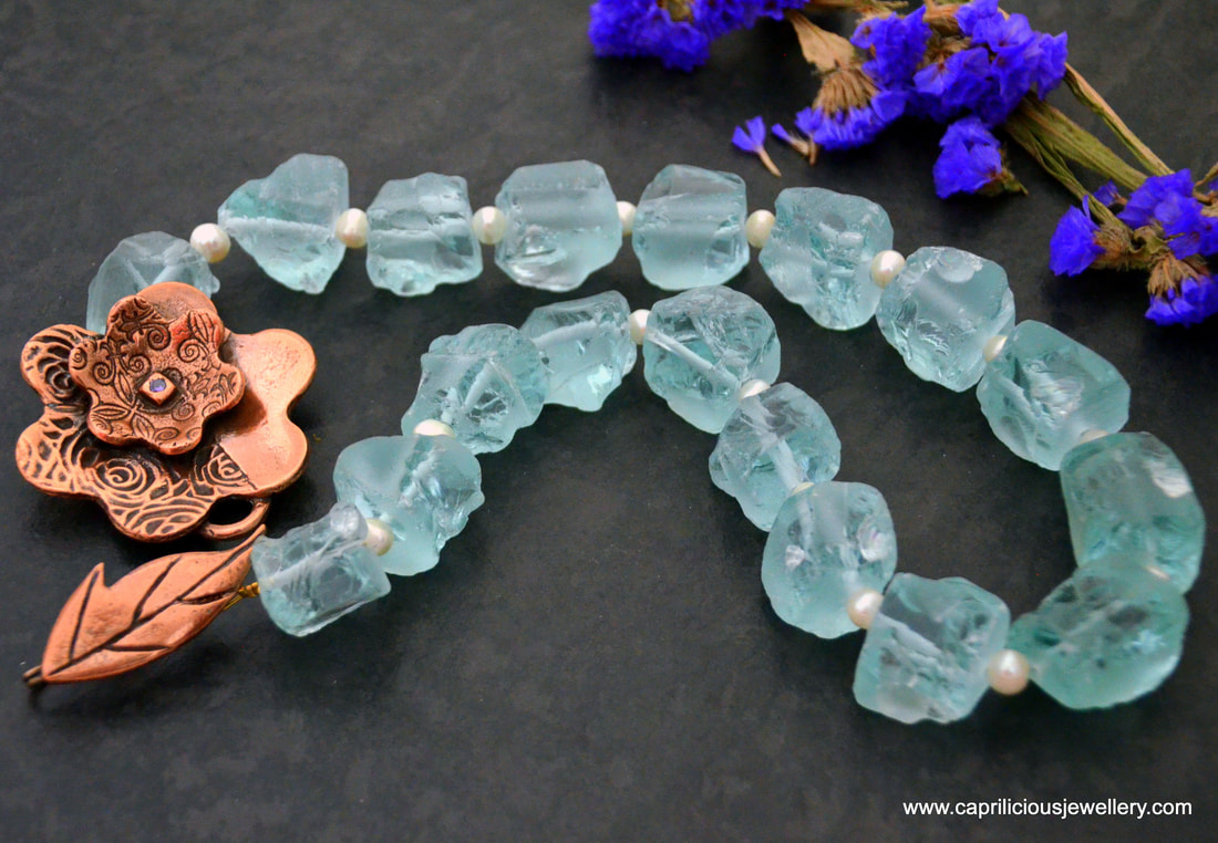 Spirit of the Sea - raw aqua quartz nuggets and pearls with a copper clay floral clasp handmade by Caprilicious Jewellery