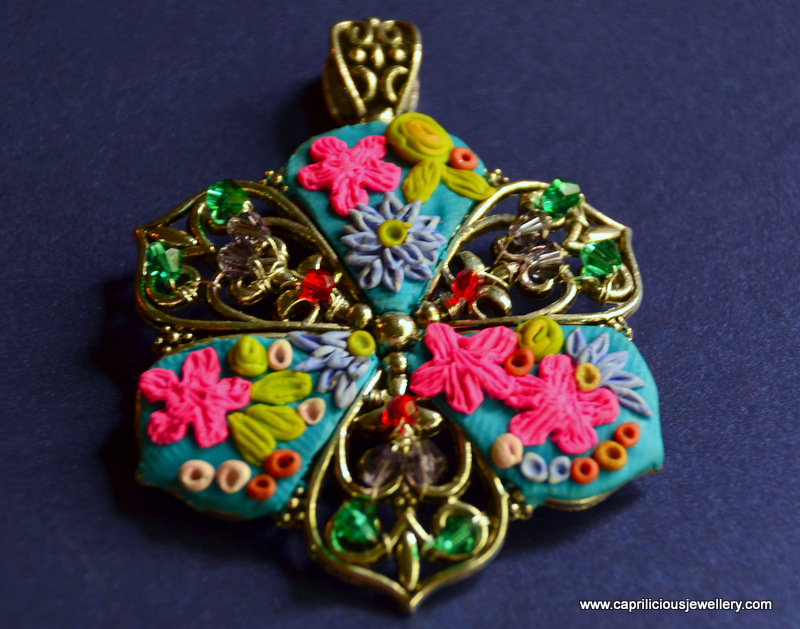 Polymer clay embroidered pendants by Caprilicious Jewellery