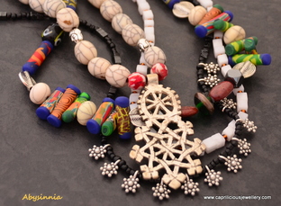 Multistrand colourful necklace with a Coptic Cross by Caprilicious Jewellery