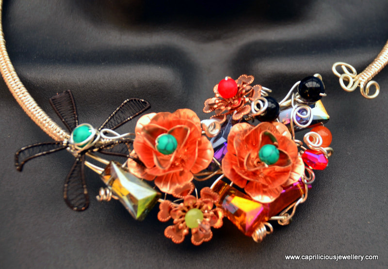 Floral torque necklace, statement necklace by Caprilicious Jewellery