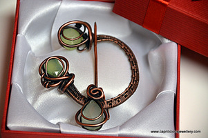 Jade and copper penannular brooch by Caprilicious Jewellery