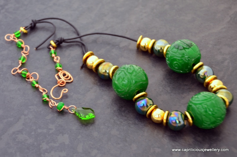 Yin - handcarved jade beads and ceramic gold plated beads by Caprilicious Jewellery
