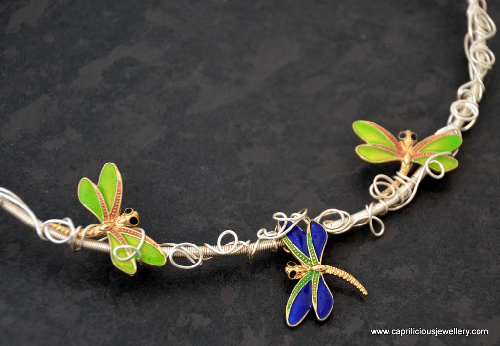 Wire torque necklace with cloisonne enamelled dragonflies by Caprilicious Jewellery