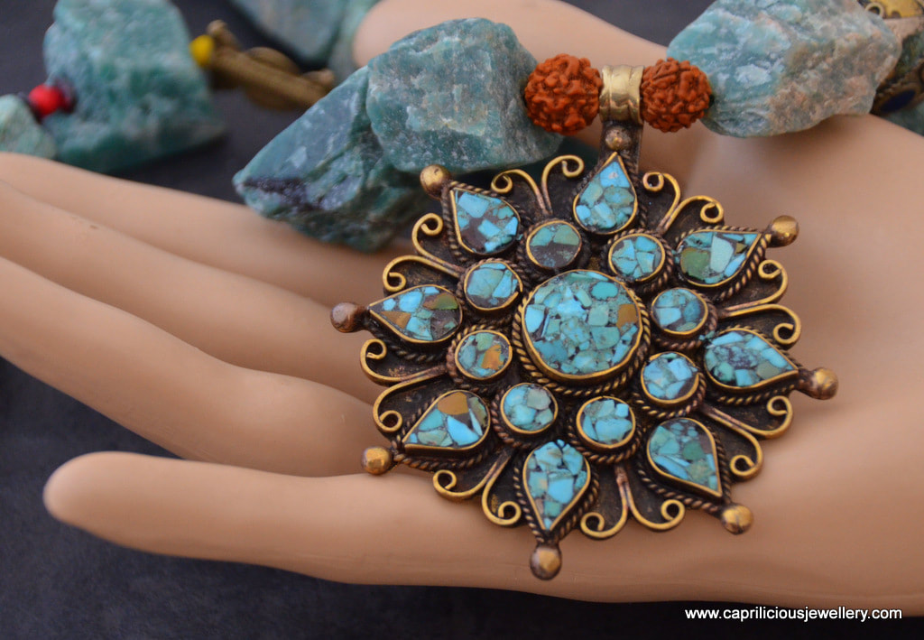 Raw aventurine nugget beads with a Tibetan Turquoise mandala pendant by Caprilicious Jewellery