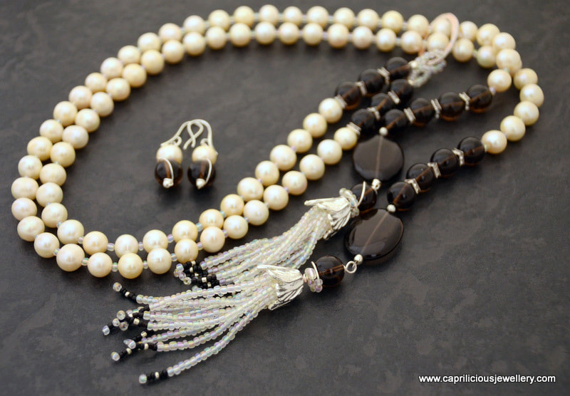 Pearl and smoky glass lariat necklace by Caprilicious Jewellery