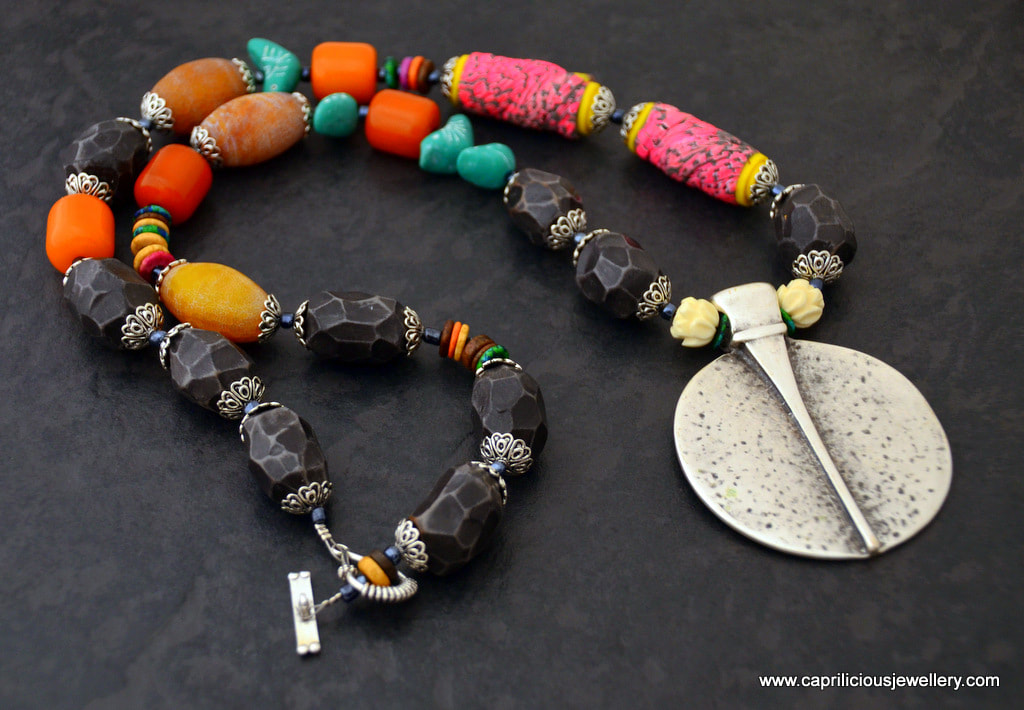 Colourful, long tribal necklace, handmade beads, polymer clay, agate and carved bone, by Caprilicious Jewellery