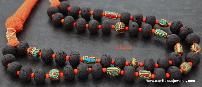 Lhasa - lava beads and Tibetan coral and turquoise brass beads in a necklace of two strands by Caprilicious Jewellery