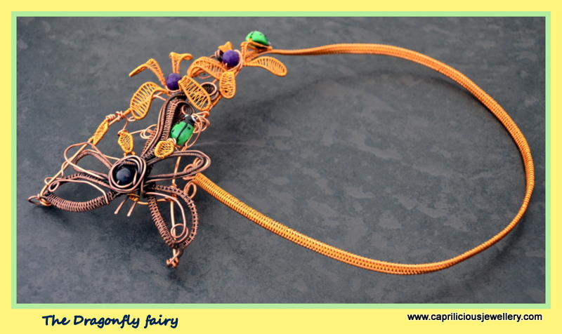 wire torque with wire flowers, dragonfly leaves and vines by Caprilicious Jewellery