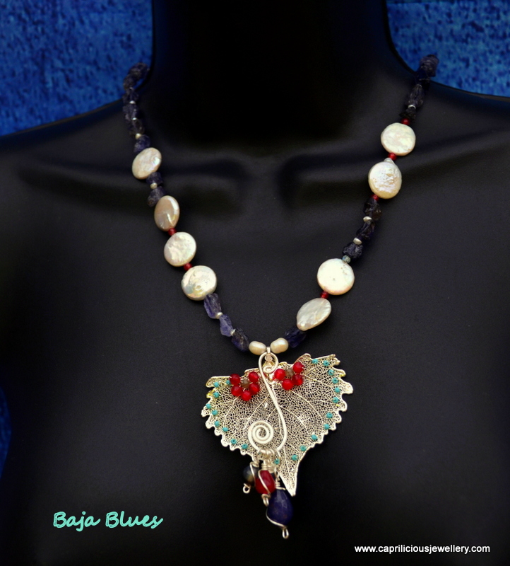 Baja Blues - Cottonwood leaf skeleton and kyanite rough nugget and coin pearl necklace by Caprilicious Jewellery