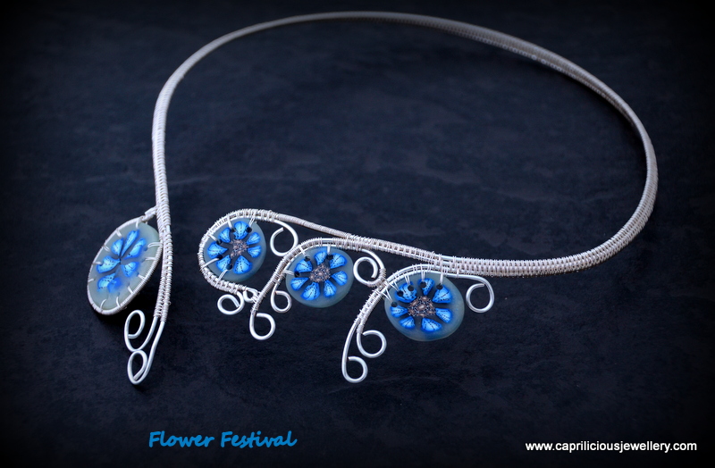 Flower Festival - polymer clay and wire torque necklace by Caprilicious Jewellery