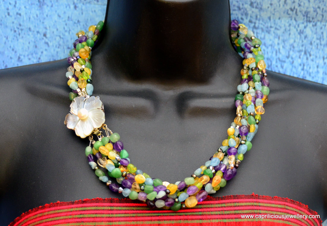 Seven strands of potato nugget beads in a summery necklace by Caprilicious Jewellery