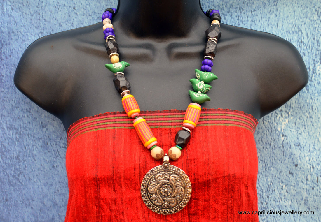 Birdie - a colourful statement necklace with a tribal vibe by Caprilicious Jewellery