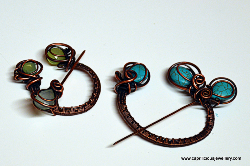 Penannular copper wire woven brooches/ fibulae by Caprilicious Jewellery