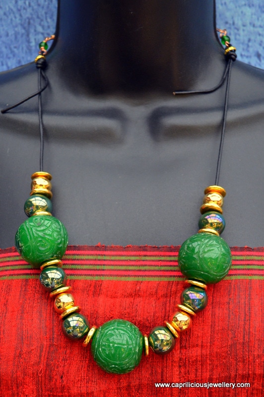 Yin - handcarved jade beads and ceramic gold plated beads by Caprilicious Jewellery