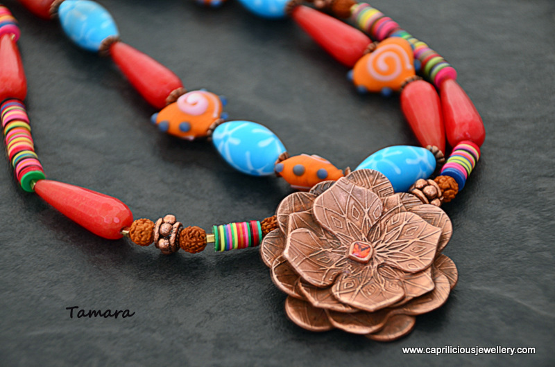 Tamara - Copper clay lotus pendant, ceramic beads, African vinyl beads, Milagro heart beads necklace, hand made polymer clay inlaid clasp by Caprilicious Jewellery