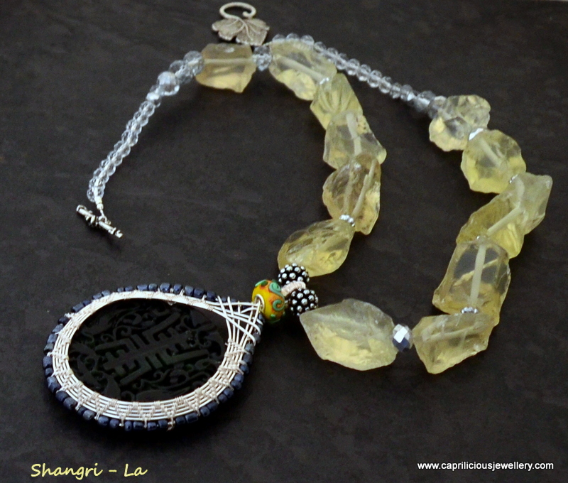 Shangri La - carved jade wire work pendant , on a citrine nugget necklace by Caprilicious Jewellery
