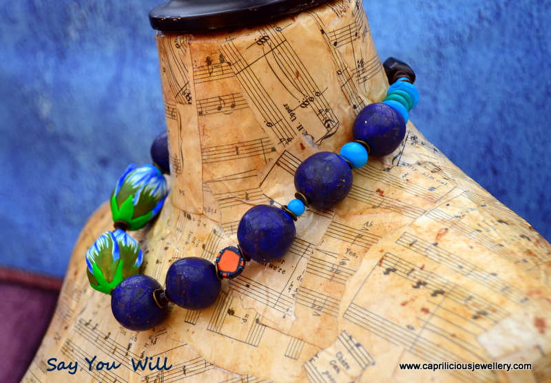 Polymer clay faux lapis lazuli beads and tulip beads in a necklace by Caprilicious Jewellery