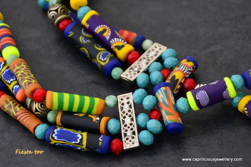 Fiesta too- a polymer clay bead multistrand necklace with tribal connectors by Caprilicious Jewellery