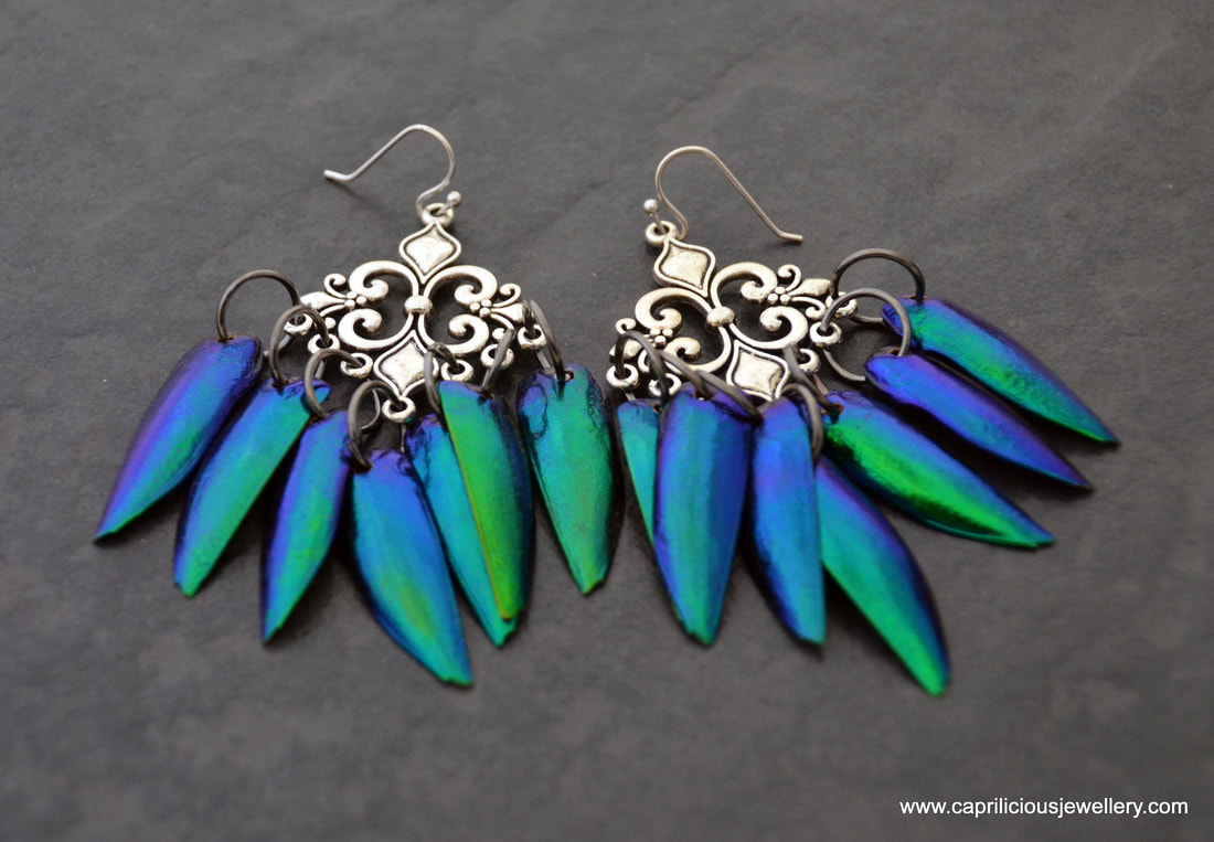 Jewellery beetle wings, elytra earrings by Caprilicious Jewellery