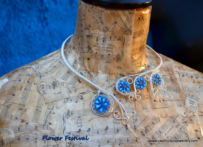 Flower Festival - polymer clay and wire torque necklace by Caprilicious Jewellery