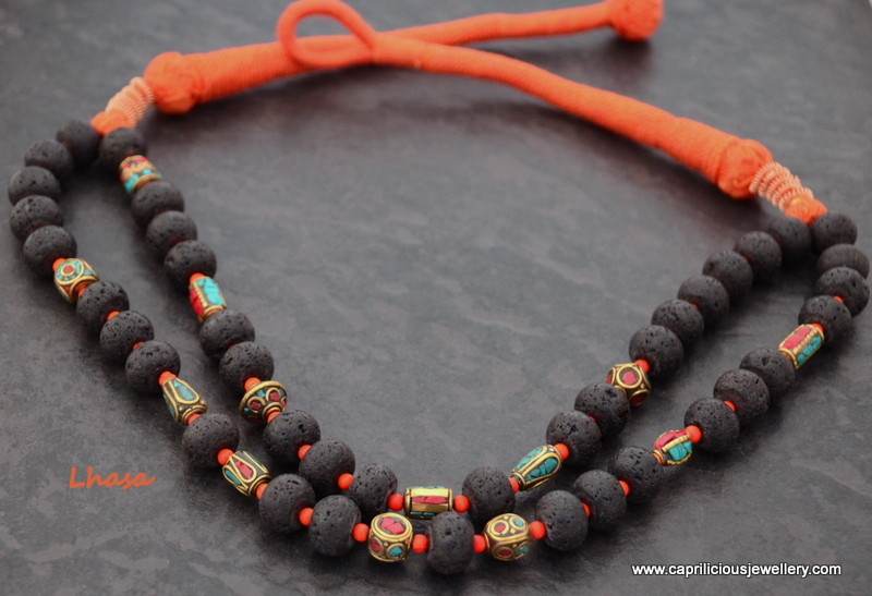Lhasa - lava beads and Tibetan coral and turquoise brass beads in a necklace of two strands by Caprilicious Jewellery