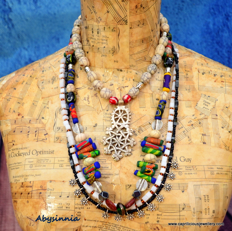 Multistrand colourful necklace with a Coptic Cross by Caprilicious Jewellery