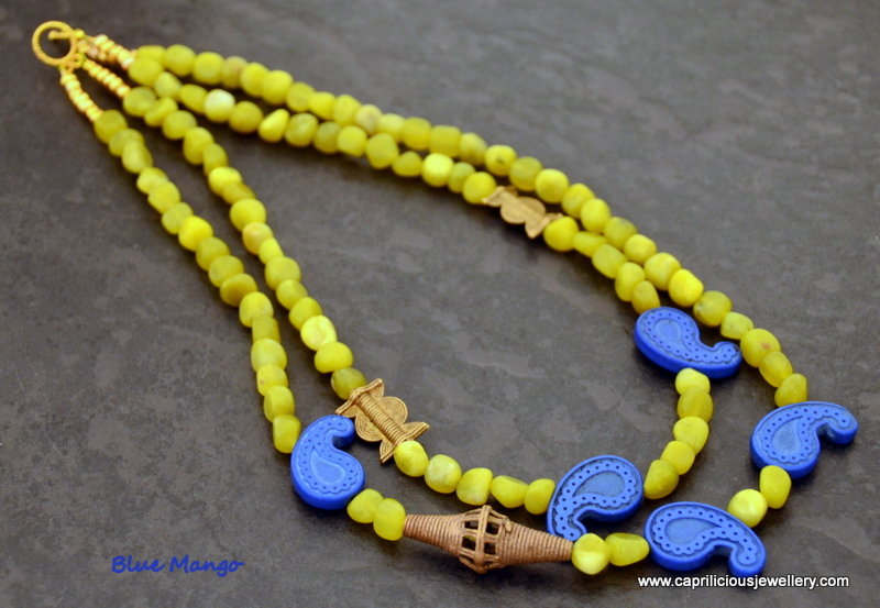 Peridot and blue howlite paisley necklace by Caprilicious Jewellery