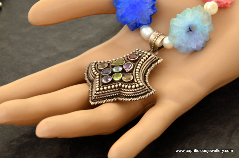 Sterling silver and semi precious gemstone pendant on a solar quartz colourful necklace by Caprilicious Jewellery