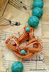 Turquoise, lapis and copper coiled wire beads with a handmade clasp by Caprilicious Jewellery