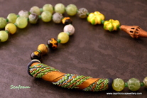 Bargello technique polymer clay bead by Caprilicious Jewellery