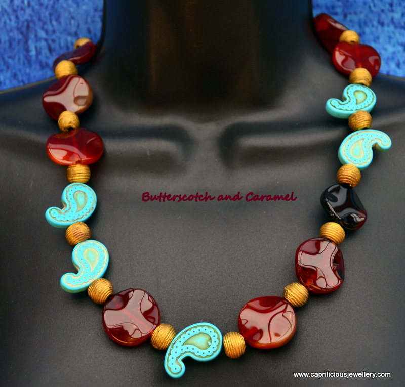 Carnelian and African Baule beads with magnesite in a necklace by Caprilicious Jewellery