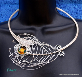 wire work torque necklace with peacock feather by Caprilicious Jewellery