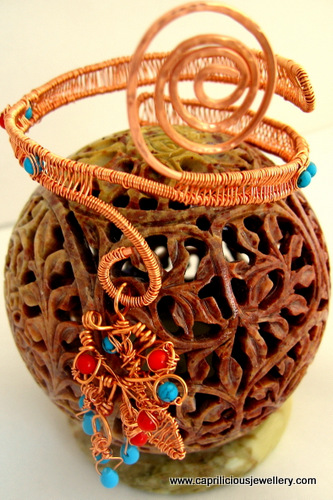 Copper wire armband embellished with coral and turquoise beads by Caprilicious Jewellery