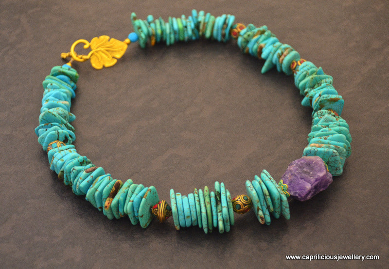 Turquoise dyed magnesite and raw amethyst in a colourful necklace by Caprilicious Jewellery