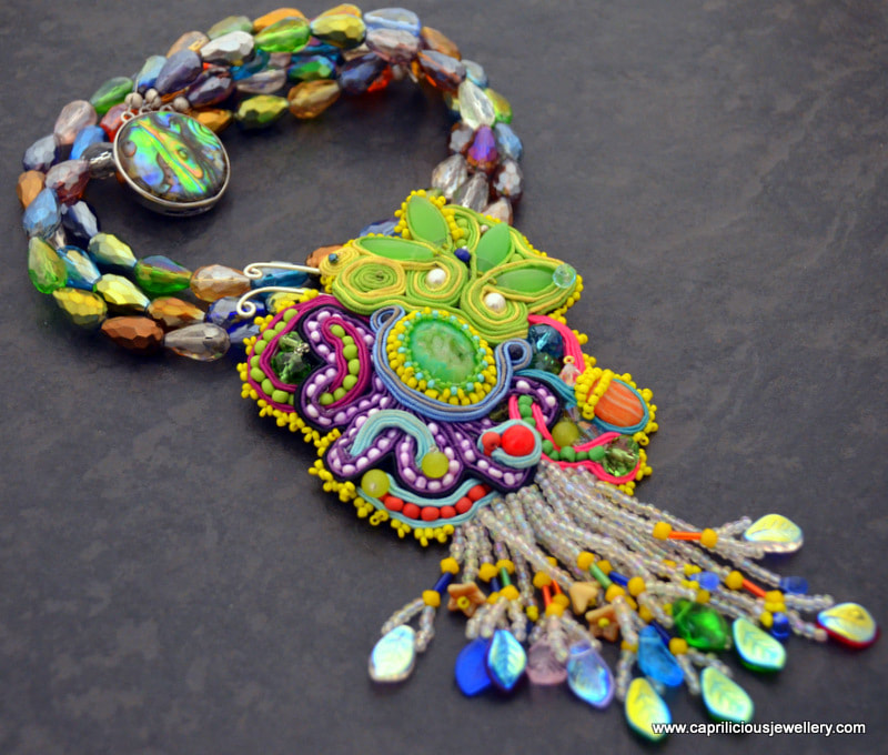 Rainforest - a soutache and beadwork pendant on a multistrand crystal necklace by Caprilicious Jewellery