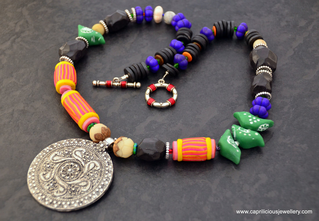 Birdie - a colourful statement necklace with a tribal vibe by Caprilicious Jewellery
