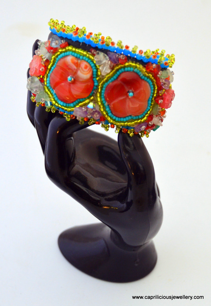 Carnelian flower and semi precious beaded bracelet on leather by Caprilicious Jewellery