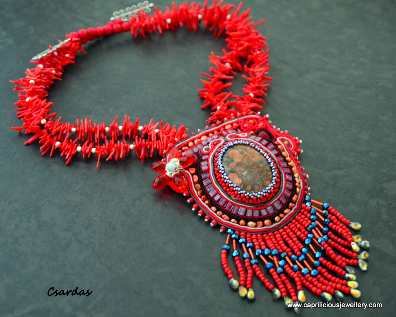 Poppy Jasper and Soutache pendant with a wirework and crystal flower on a coral necklace by Caprilicious Jewellery