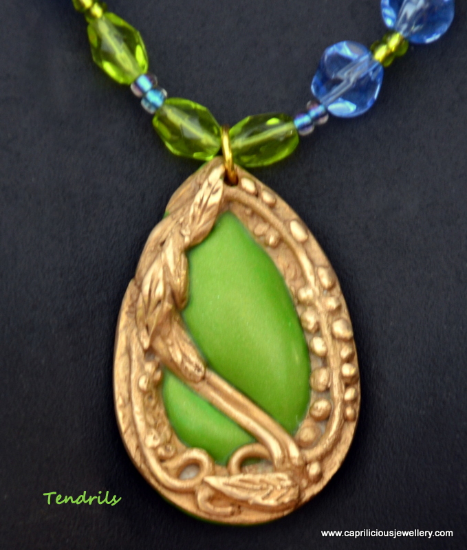 Bronze clay and polymer clay pendant from Caprilicious Jewellery