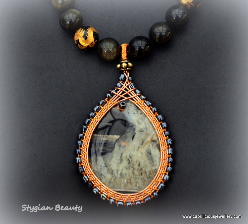 Stygian Beauty - golden obsidian with a wireworked agate pendant by Caprilicious Jewellery