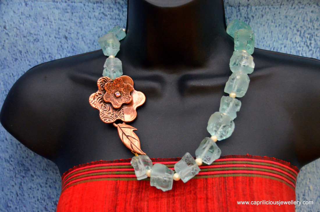 Spirit of the Sea - raw aqua quartz nuggets and pearls with a copper clay floral clasp handmade by Caprilicious Jewellery
