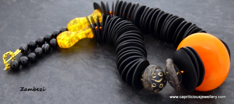 Zambezi - polymer clay and faux amber necklace by Caprilicious Jewellery