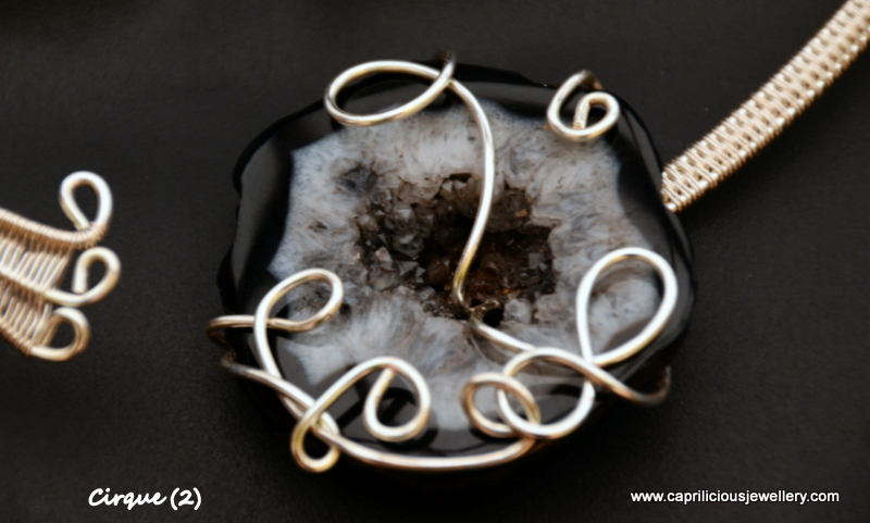 Wirework torque necklace with a black and white druzy by Caprilicious Jewellery