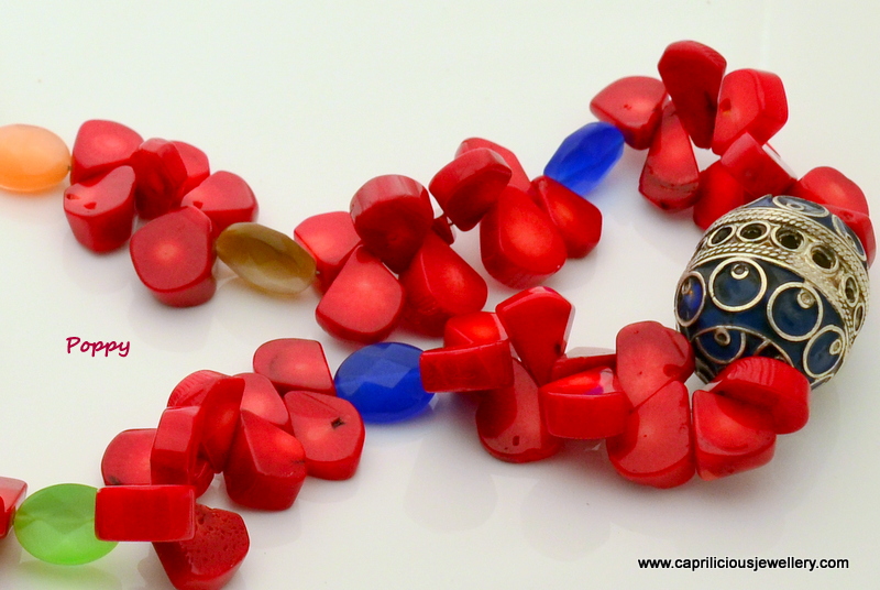 Coral and Moroccan bead necklace with cats eye accents by Caprilicious Jewellery