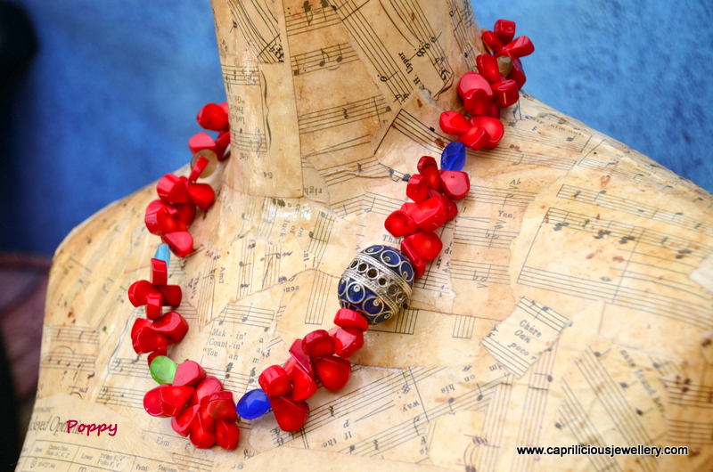 Coral and Moroccan bead necklace with cats eye accents by Caprilicious Jewellery