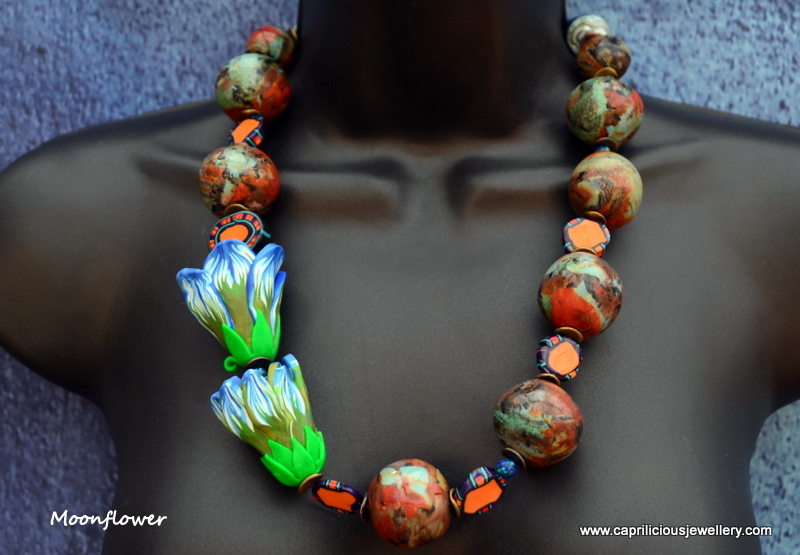 Polymer clay flower and faux turquoise bead necklace by Caprilicious Jewellery