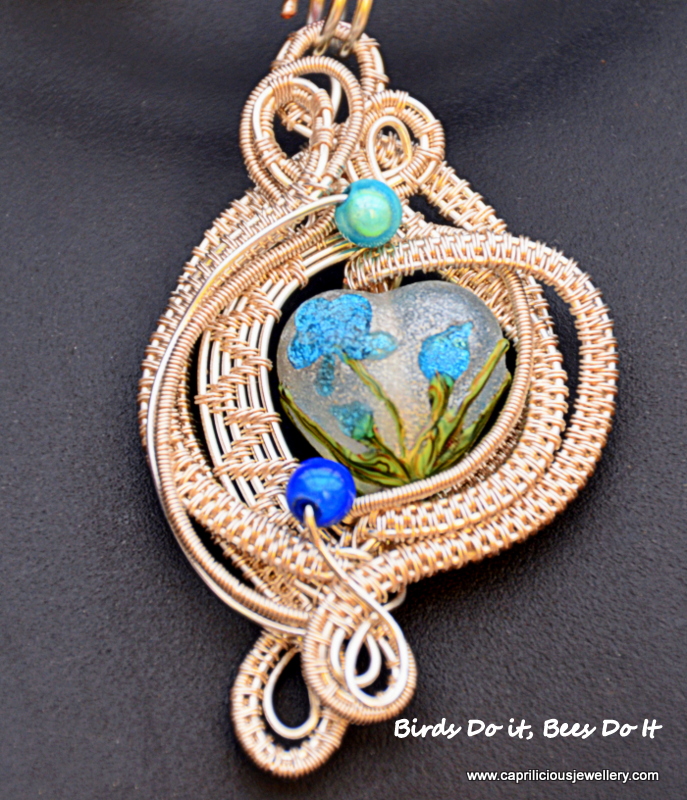 Lampwork glass heart and wirework pendant by Caprilicious Jewellery