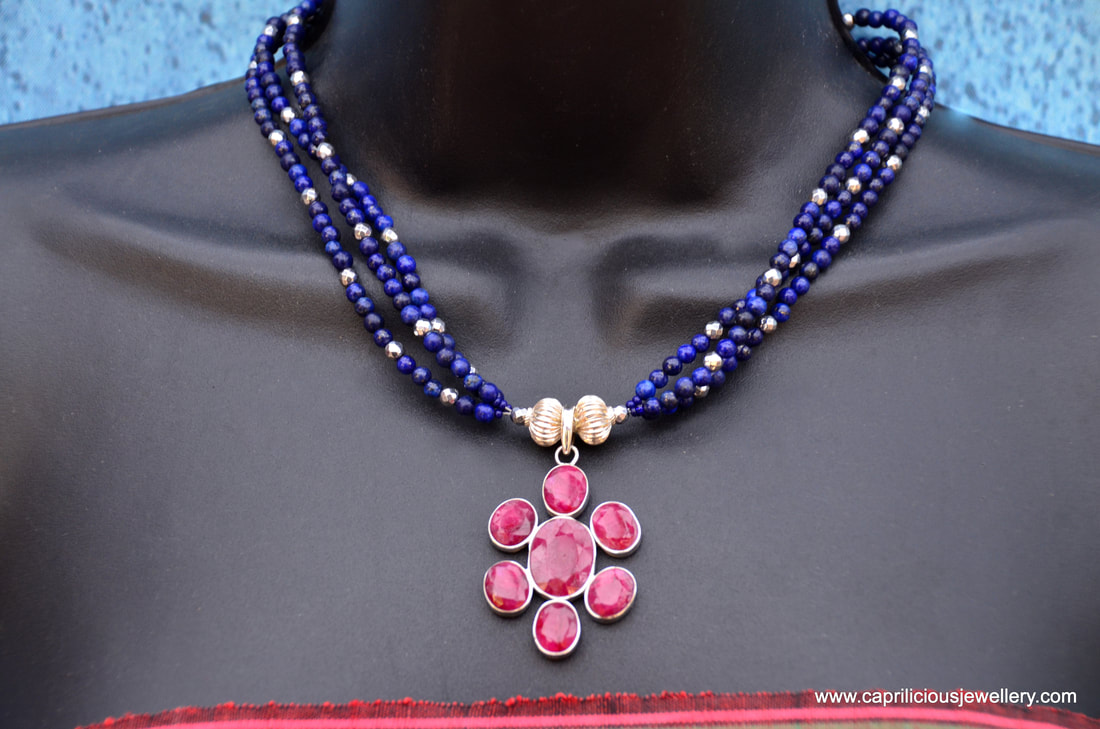 lapis, rubies, silver jewellery, red and blue jewellery, statement necklace, ruby pendant, floral jewellery