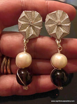 Stud earrings by Caprilicious