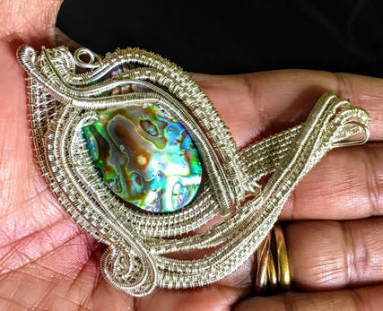 Abalone (Paua shell) wire work pendant by Caprilicious Jewellery